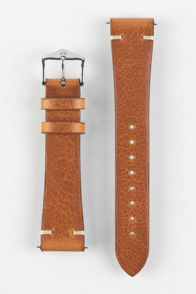 The topside of a Hirsch Bagnore gold brown two-stitch vintage leather watch strap.